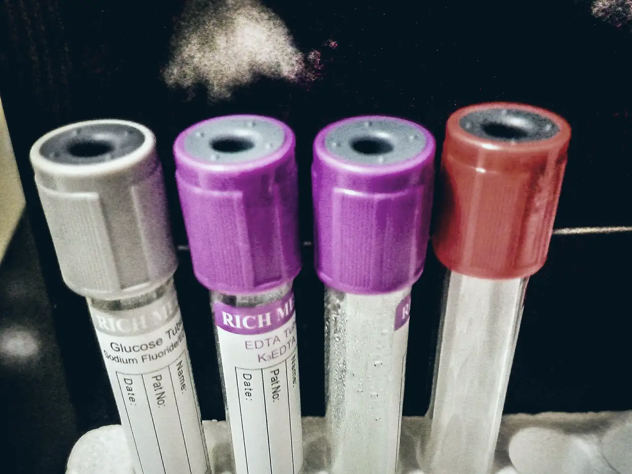 Blood collection tubes with coloured caps