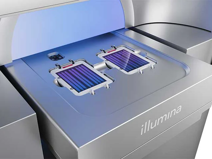Two flow cells loaded on the stage of an Illumina NovaSeq X Plus sequencer